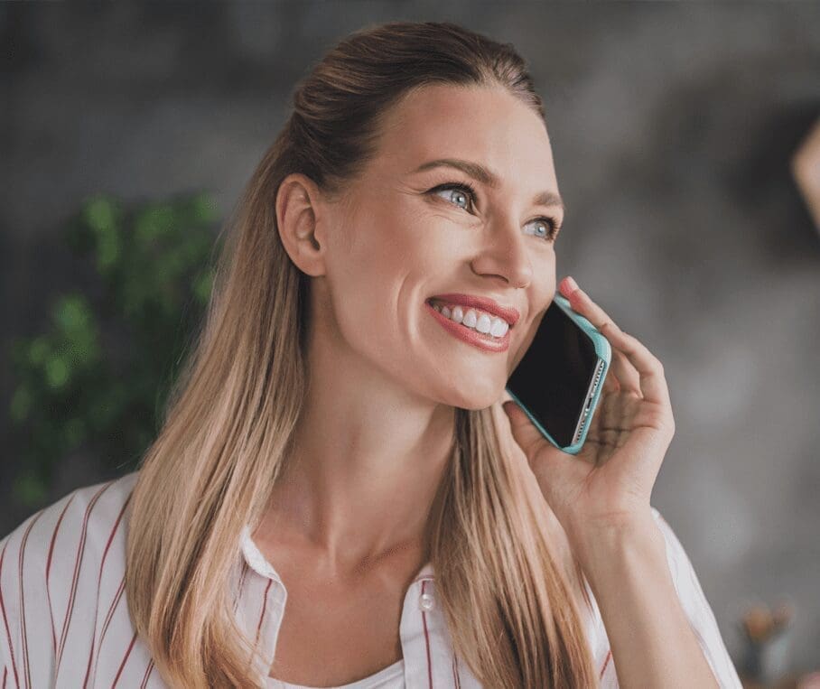 happy woman on her cell phone